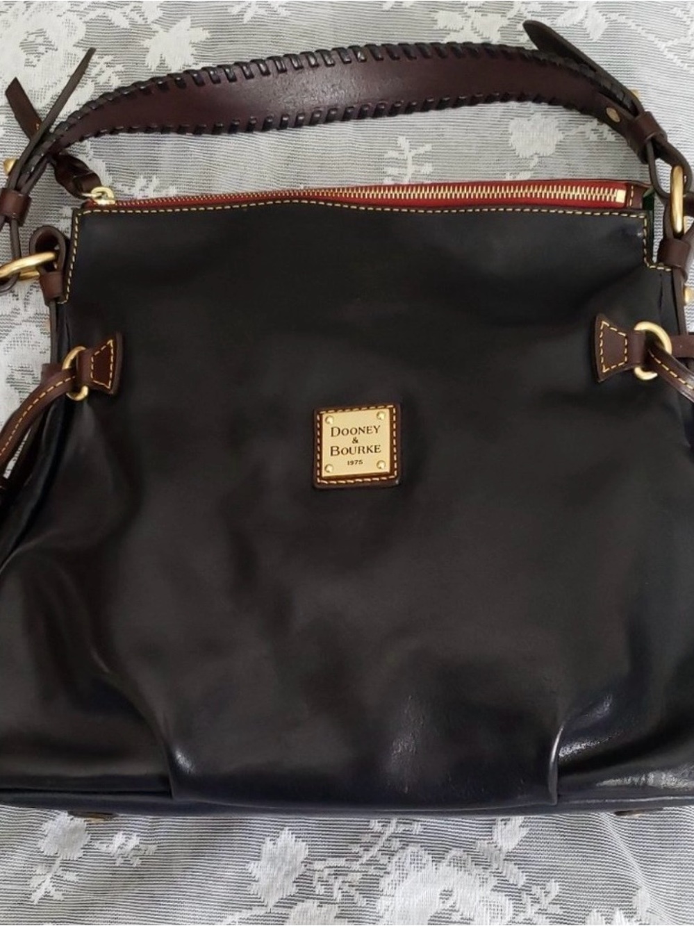 Dooney & Bourke Black Leather Shoulder Bag with Gold Accents